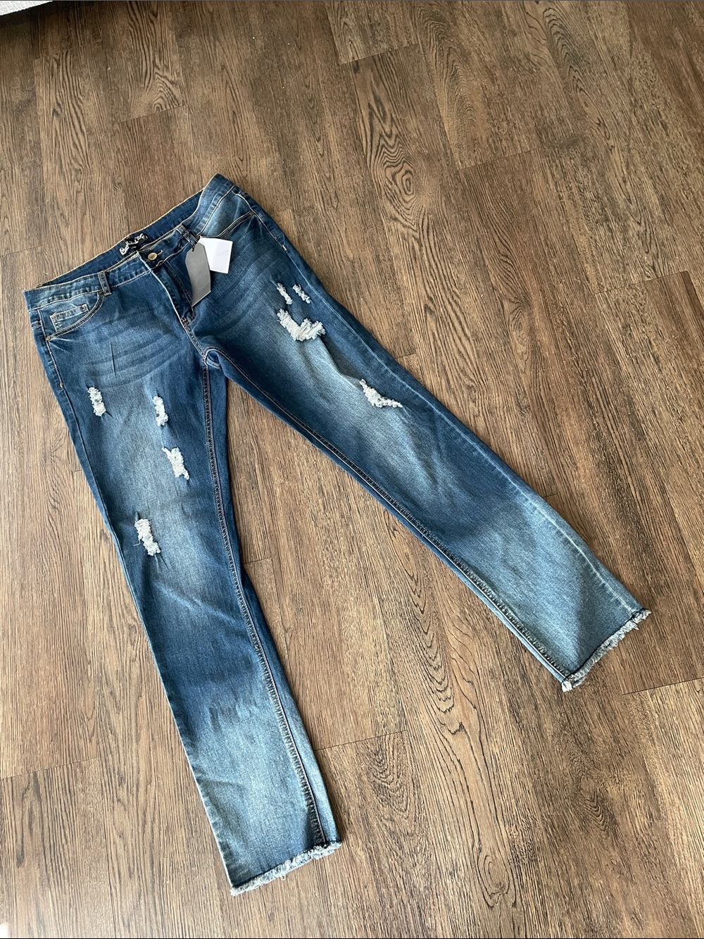 Straight Leg Distressed Women’s Jeans in Medium Blue